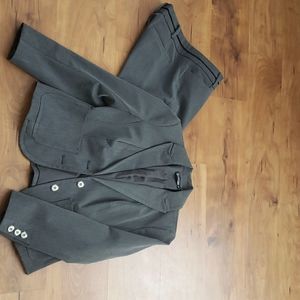 Grey suit with black piping